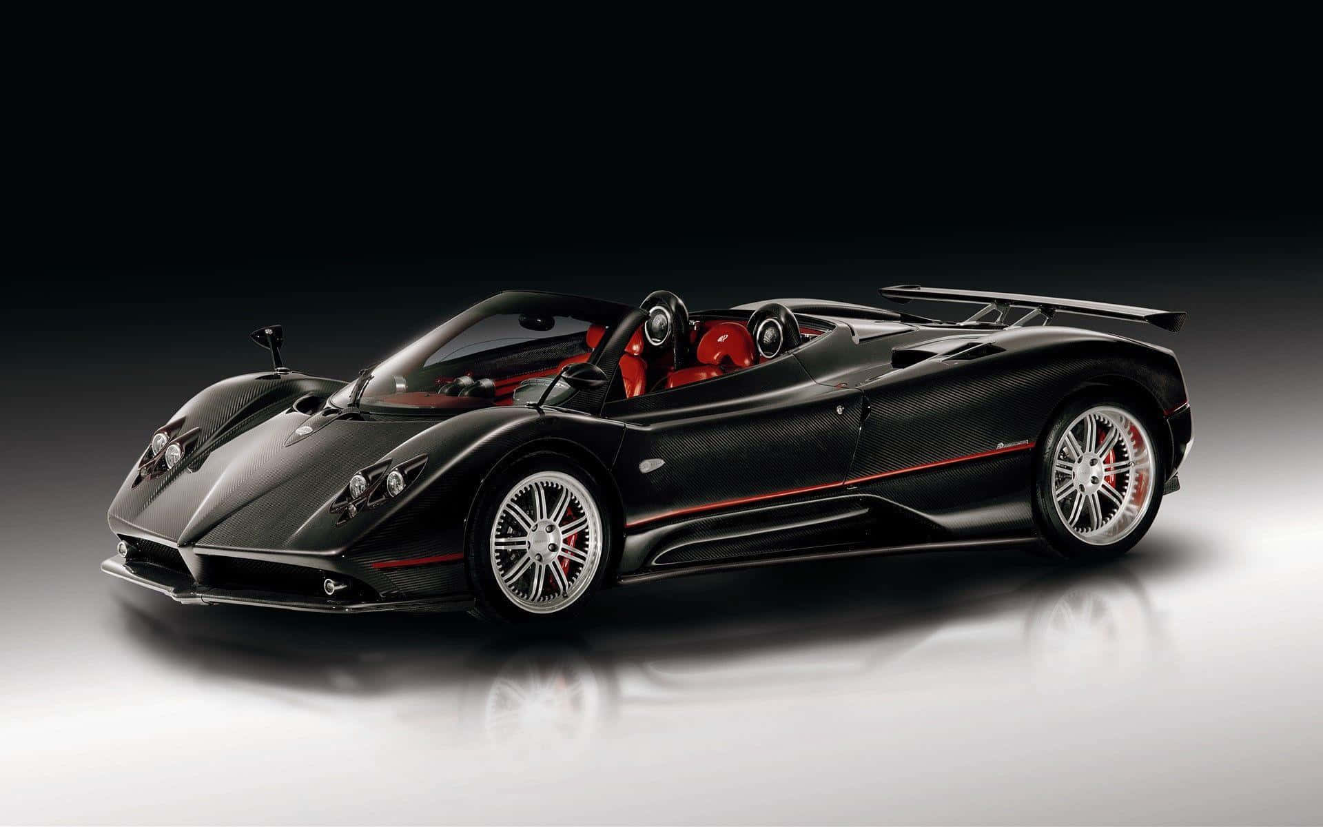 Caption: Pristine And Powerful - A Visual Spectacle Of A Sleek Pagani Zonda F. Wallpaper