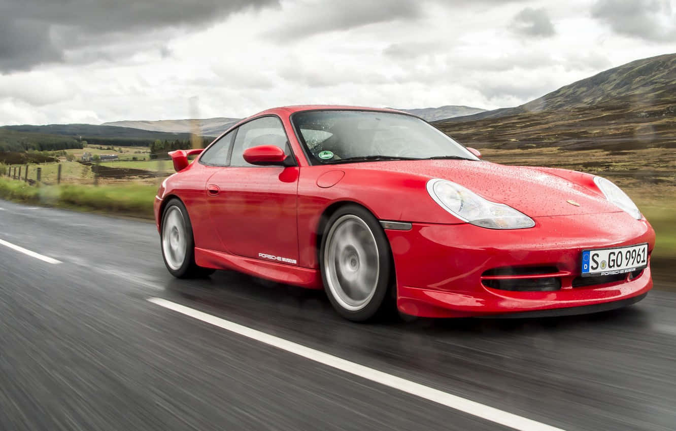 Pristine Porsche 996 Under A Magical Dusk Sky. Bakgrunnsbildet