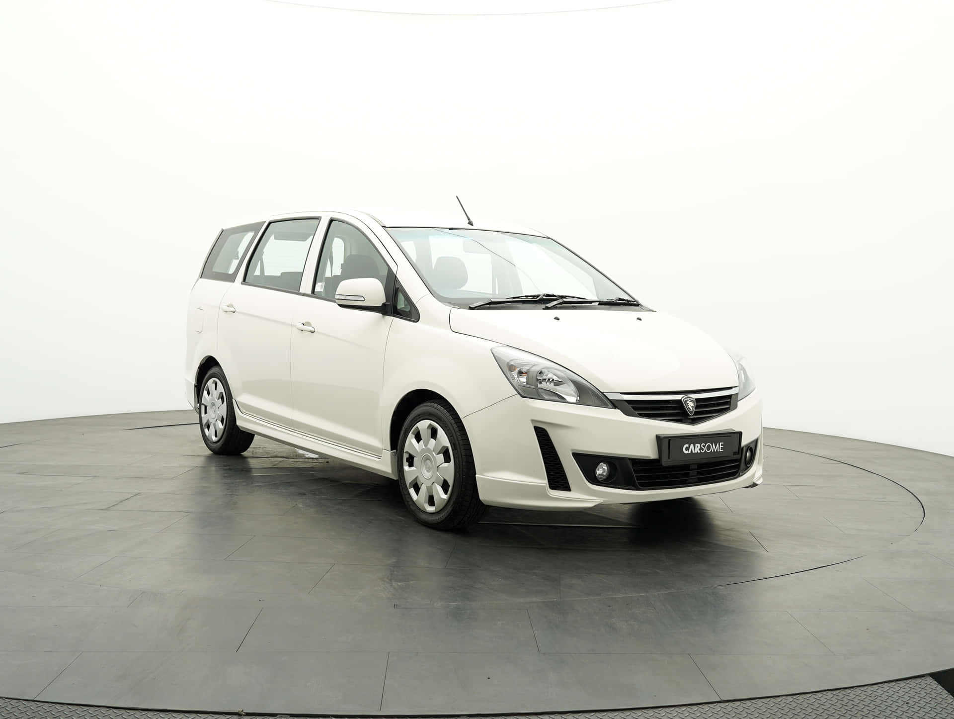 Caption: Proton Exora – Sporty Elegance On The Road Wallpaper