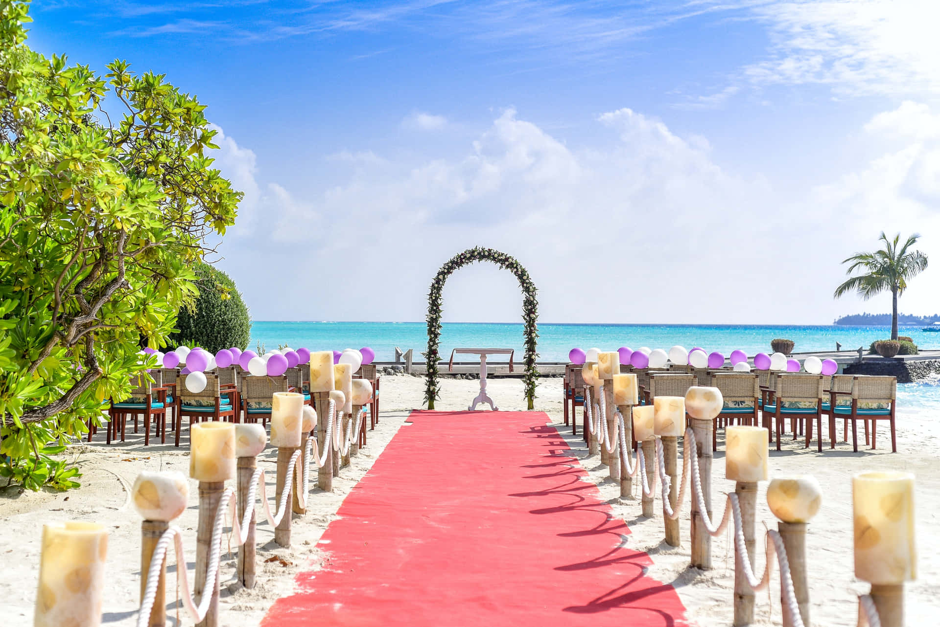 Caption: Romantic Beach Wedding Photoshoot Wallpaper