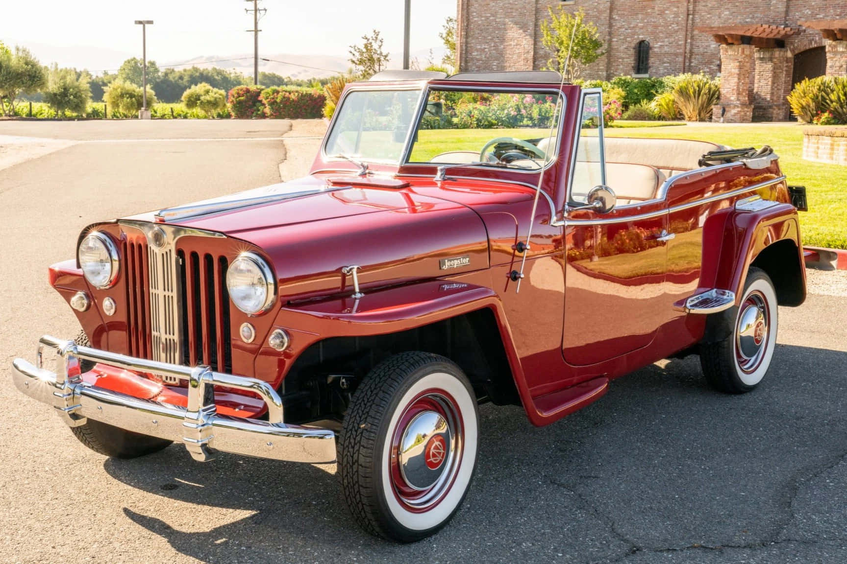 Caption: Rugged Luxury - The Jeepster Off-road Adventure Wallpaper