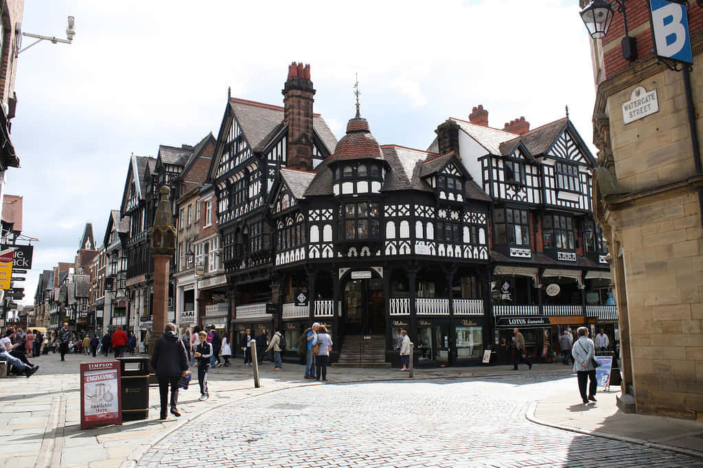 Caption: Scenic View Of The Historic City Of Chester, Uk. Wallpaper