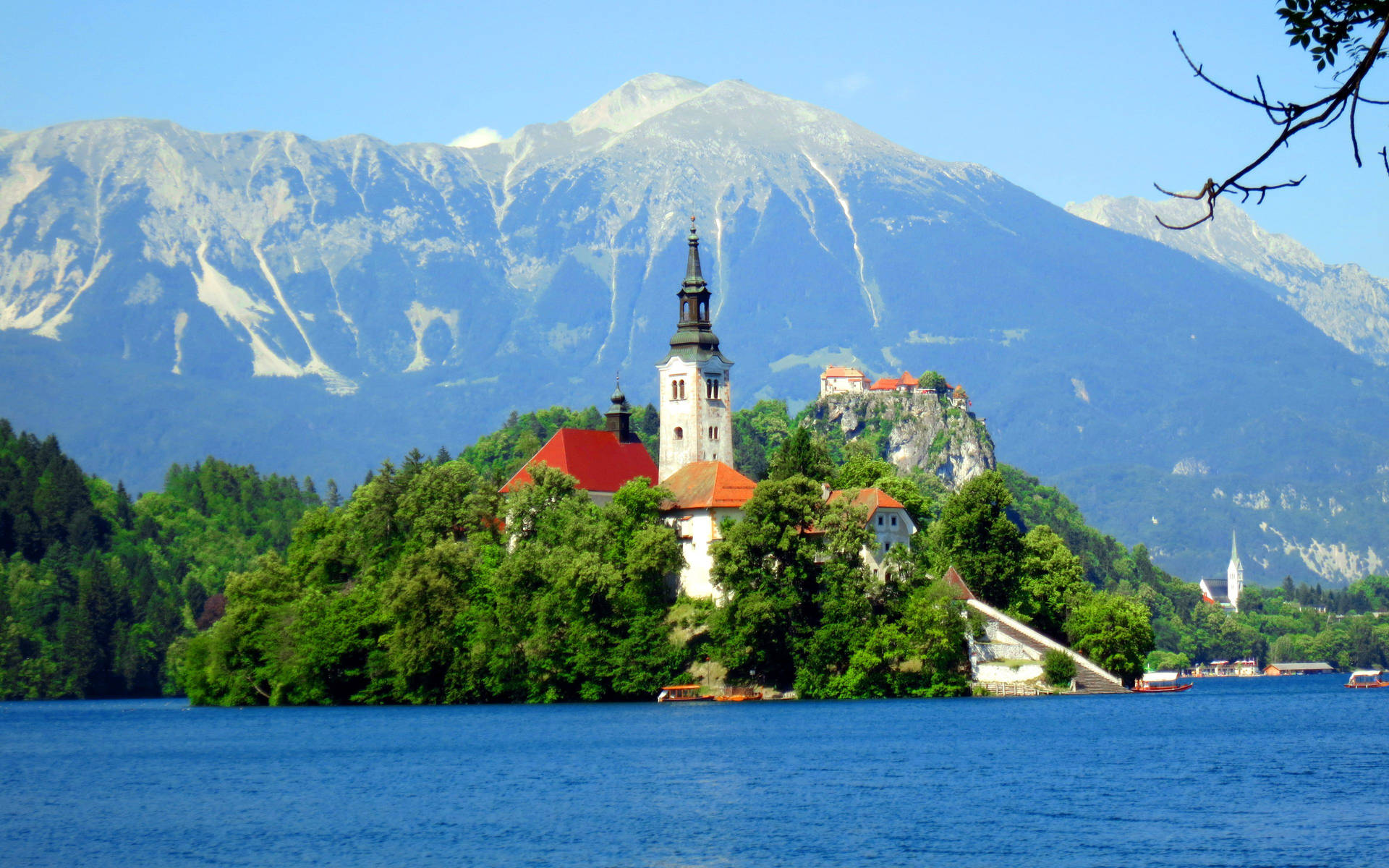 Caption: Serene View Of Lake Bled In Slovenia Wallpaper