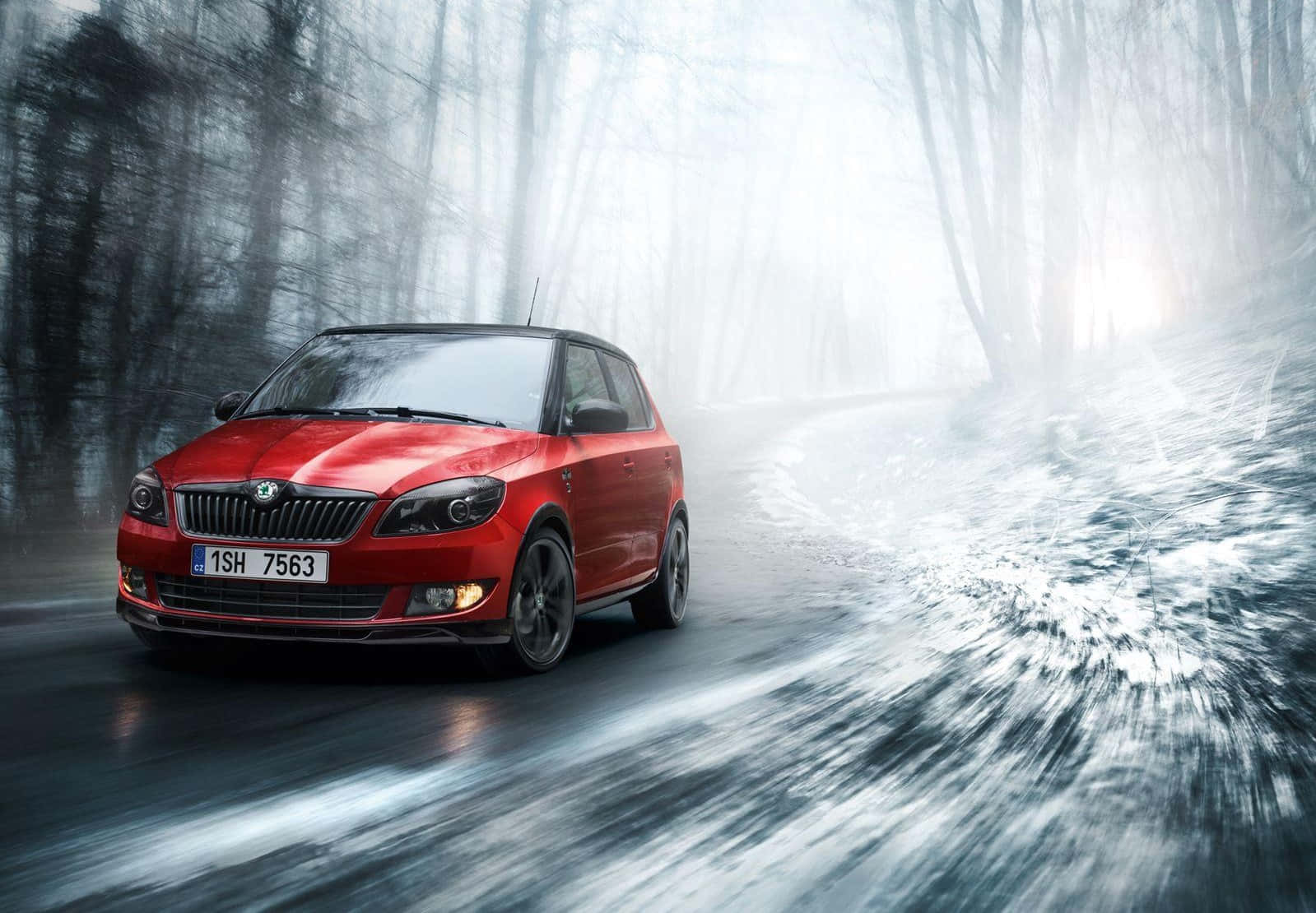 Caption: Sleek And Chic - Skoda Fabia In Vibrant Red Wallpaper