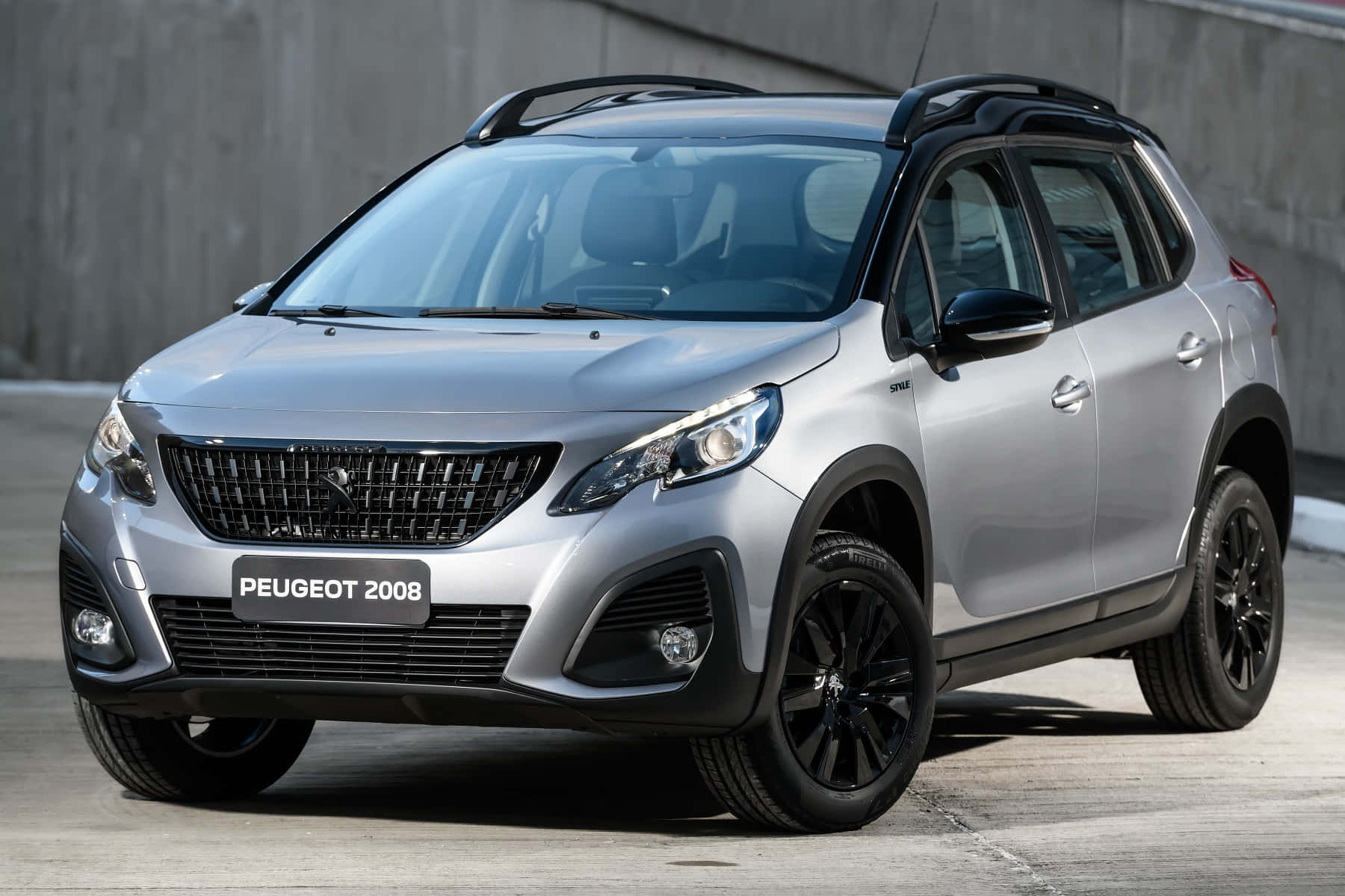 Caption: Sleek And High-performance Peugeot 2008 On The Road Wallpaper