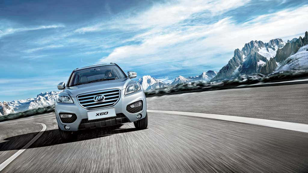 Caption: Sleek And Sporty Lifan X60 On The Move Wallpaper