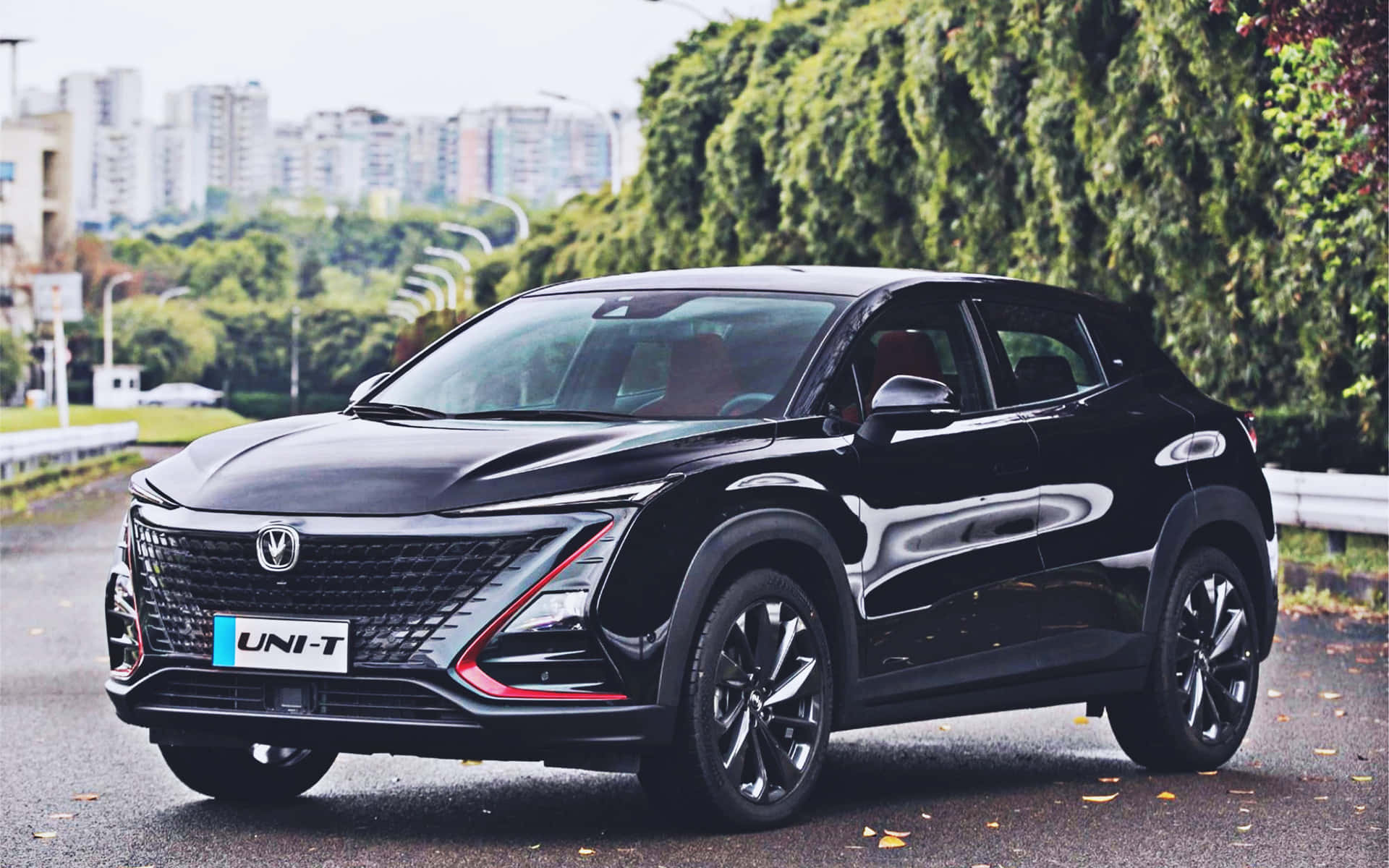 Caption: Sleek And Stylish Changan Uni-t On The Road Wallpaper