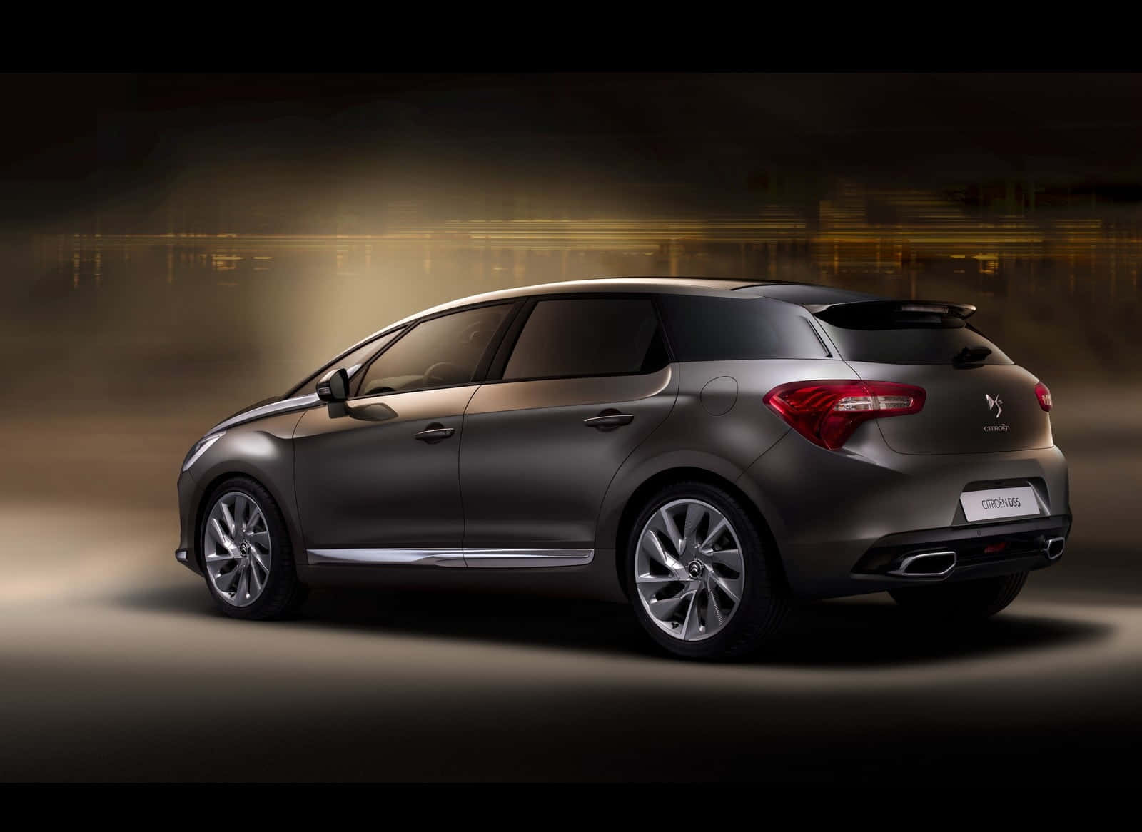 Caption: Sleek And Stylish Citroën Ds5 In A Sunset Backdrop Wallpaper