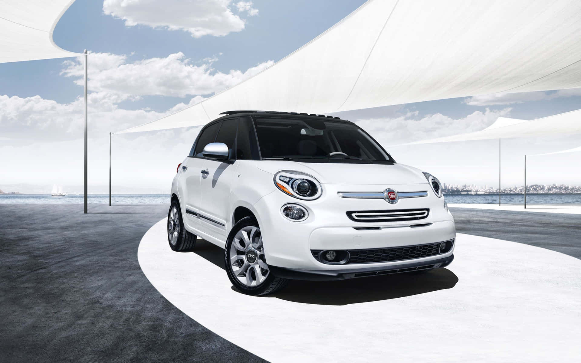 Caption: Sleek And Stylish Fiat 500x On The Open Road Wallpaper