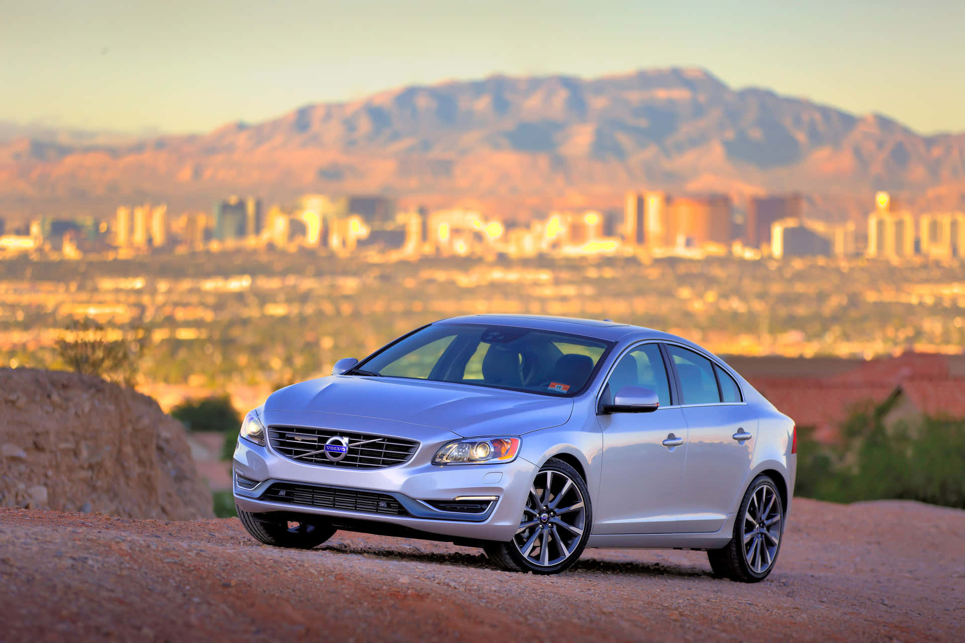Caption: Sleek And Stylish Volvo S60 On The Highway Wallpaper