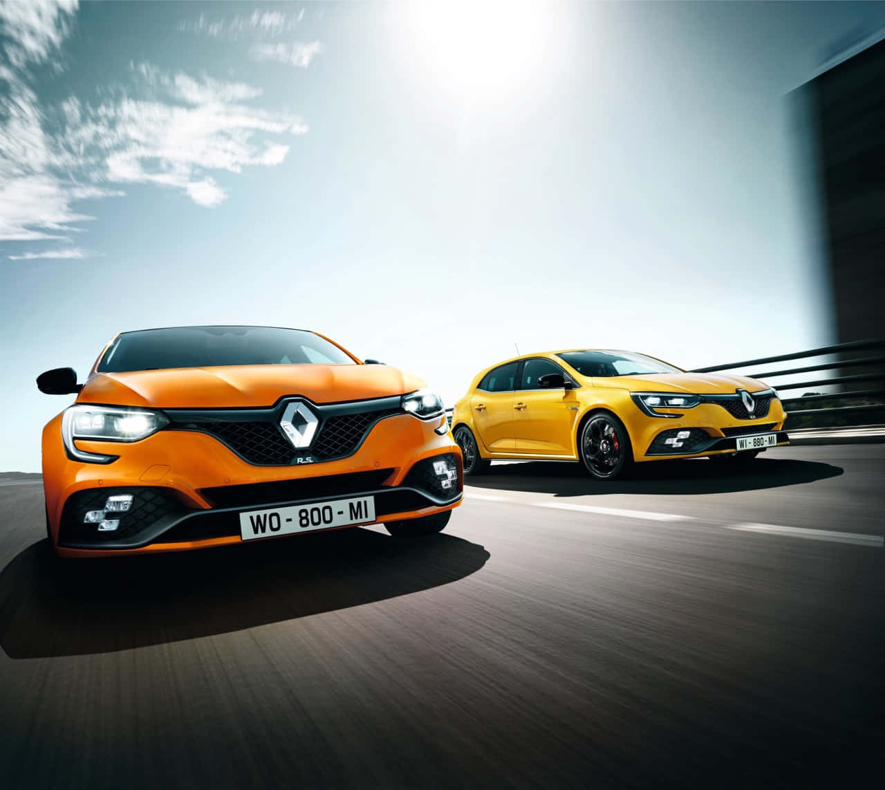 Caption: Sleek Renault Megane In Dynamic Landscape Wallpaper