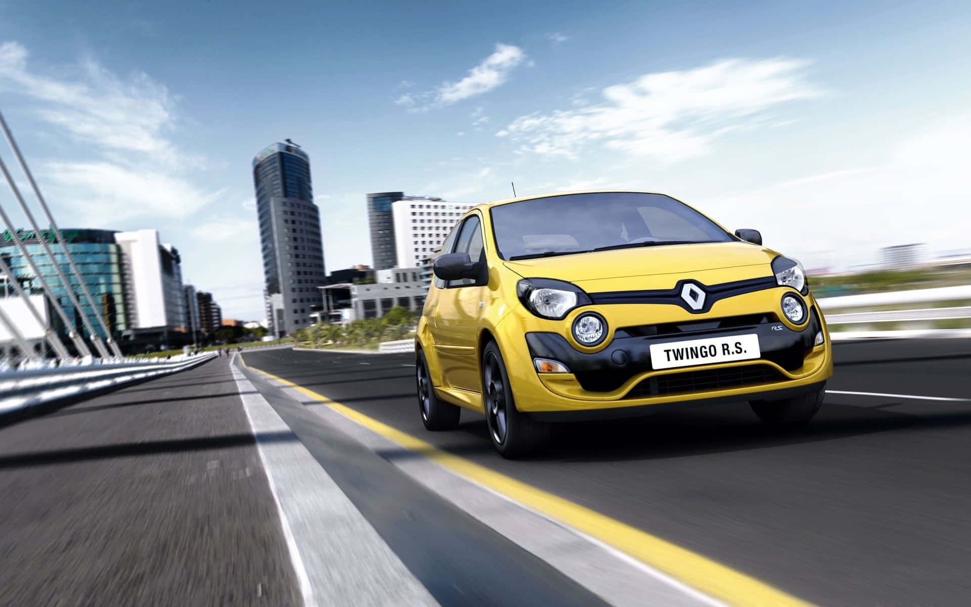 Caption: Sleek Silver Renault Twingo On A Scenic Drive Wallpaper