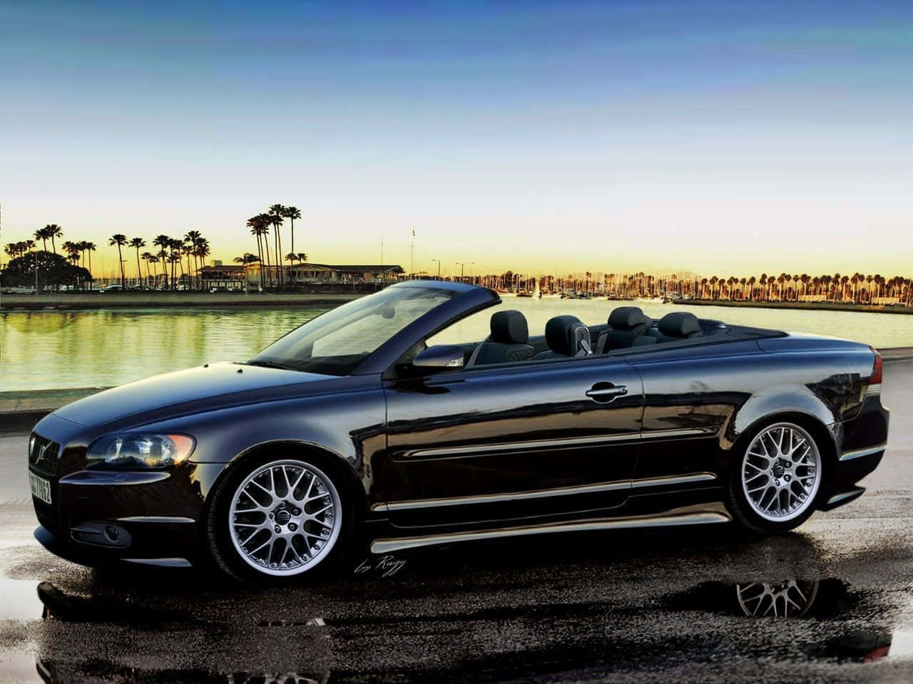 Caption: Sleek Volvo C70 Coupe On A Natural Background Wallpaper