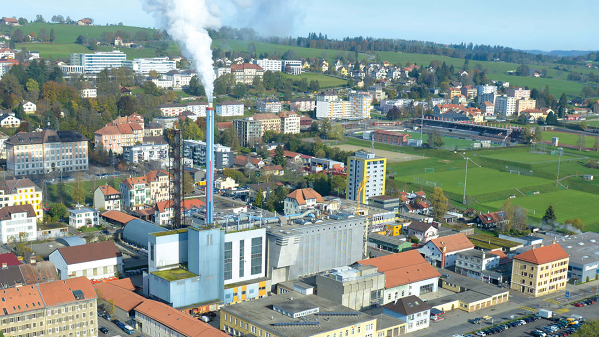 Caption: Spectacular View Of La Chaux De Fonds At Dusk Wallpaper