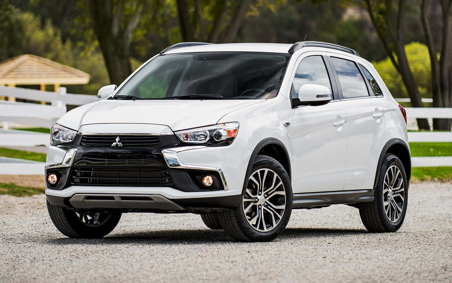 Caption: Striking Appearance Of The Mitsubishi Outlander Wallpaper