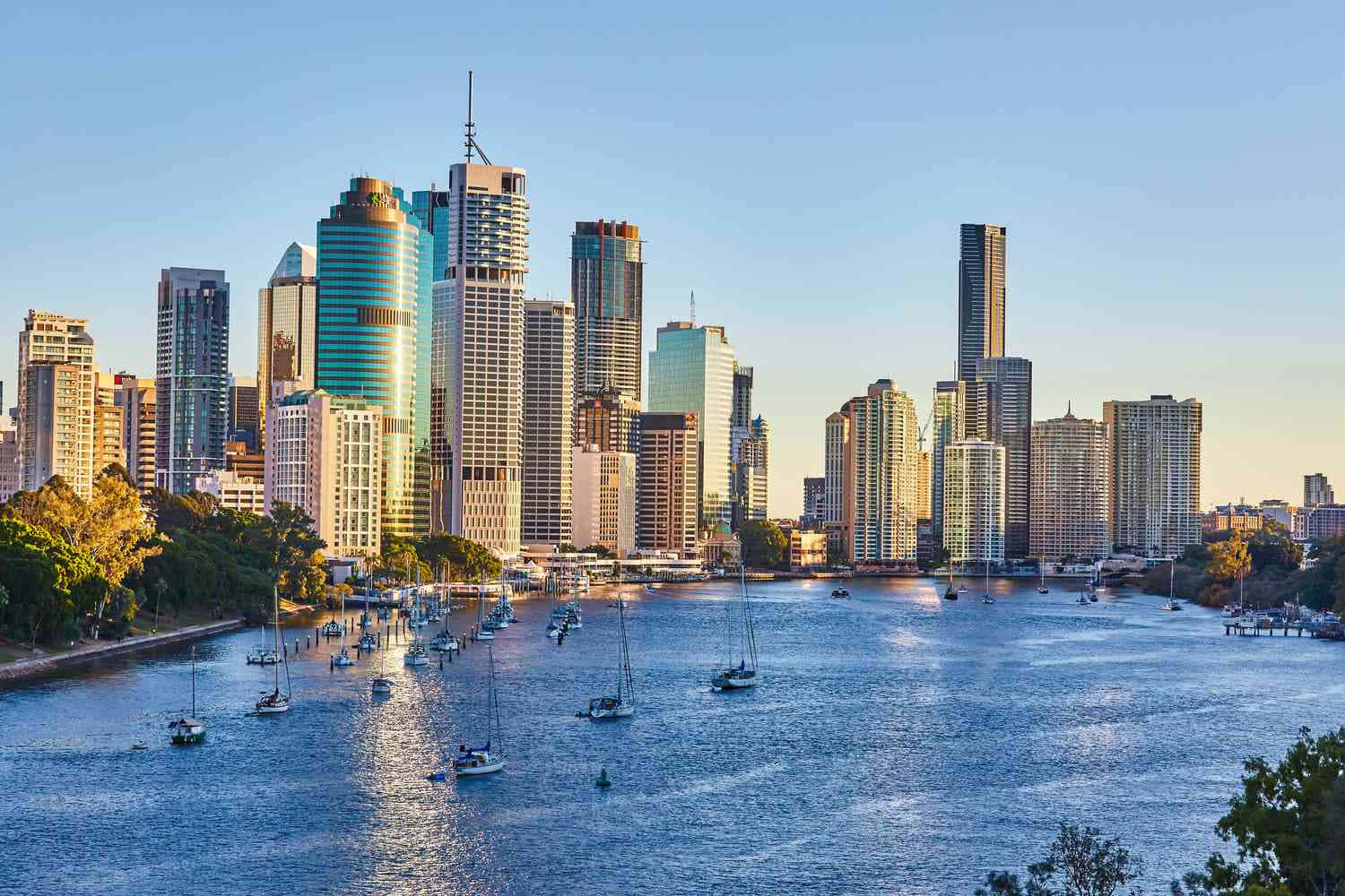 Caption: Stunning Brisbane Cityscape At Twilight Wallpaper