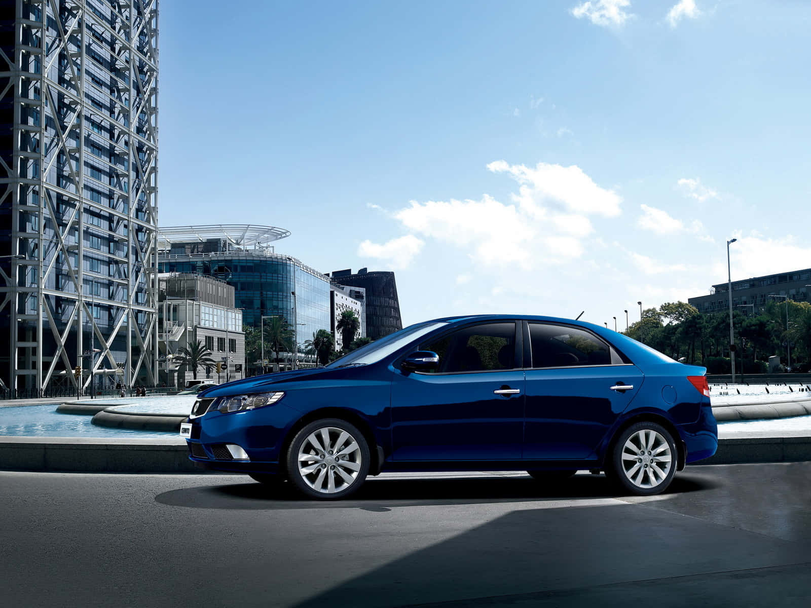 Caption: Stunning Kia Spectra In Lustrous Blue Wallpaper