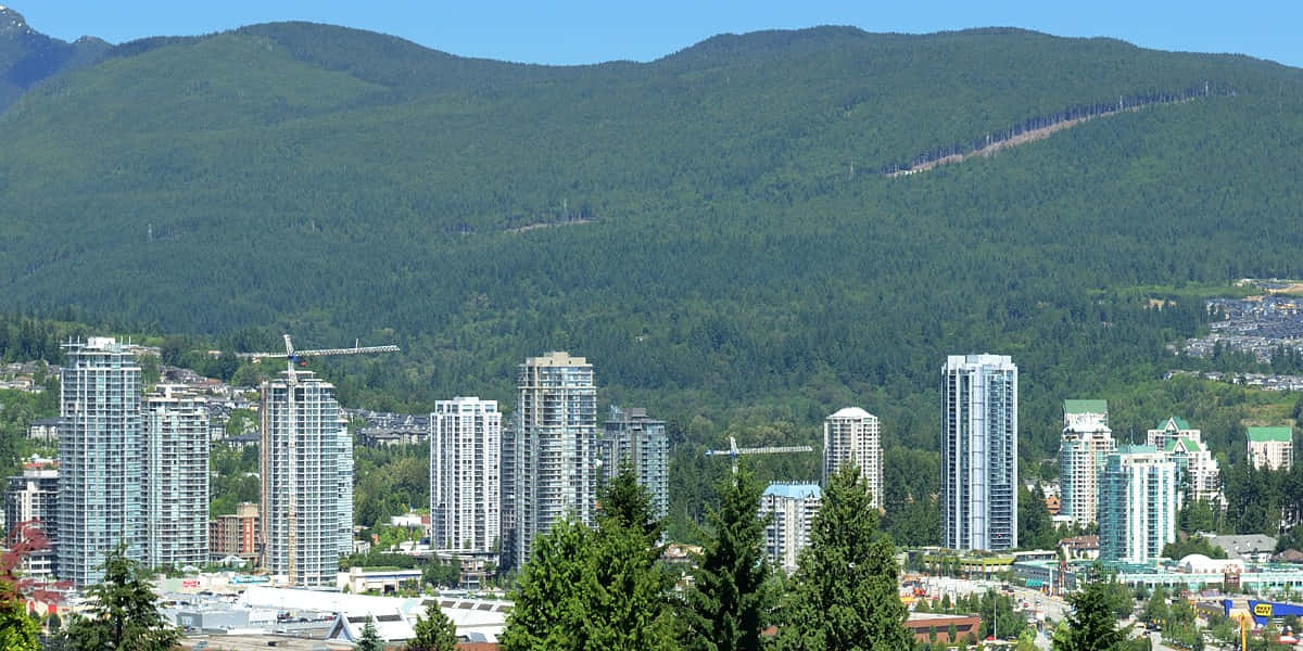 Caption: Stunning Landscape View Of Coquitlam Wallpaper