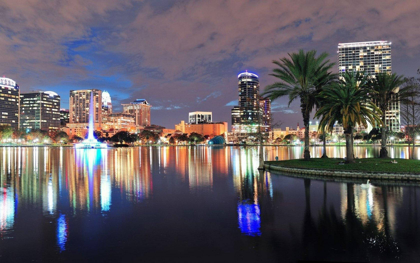 Caption: Stunning Twilight View Of Orlando City Skyline Wallpaper