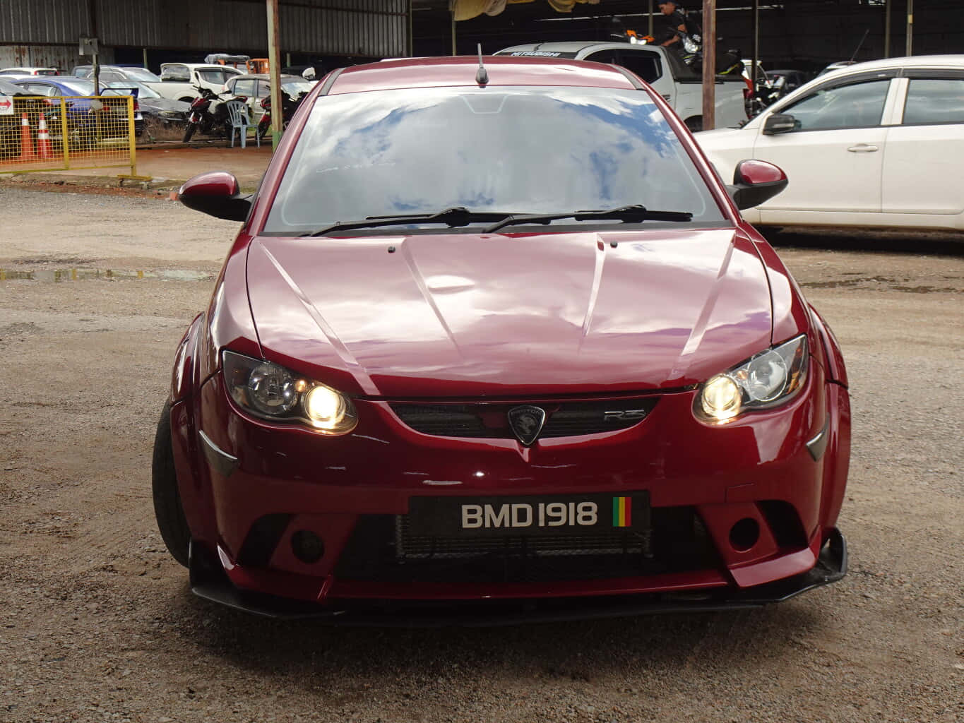 Caption: Stylish Proton Satria-neo In Superior Performance Wallpaper