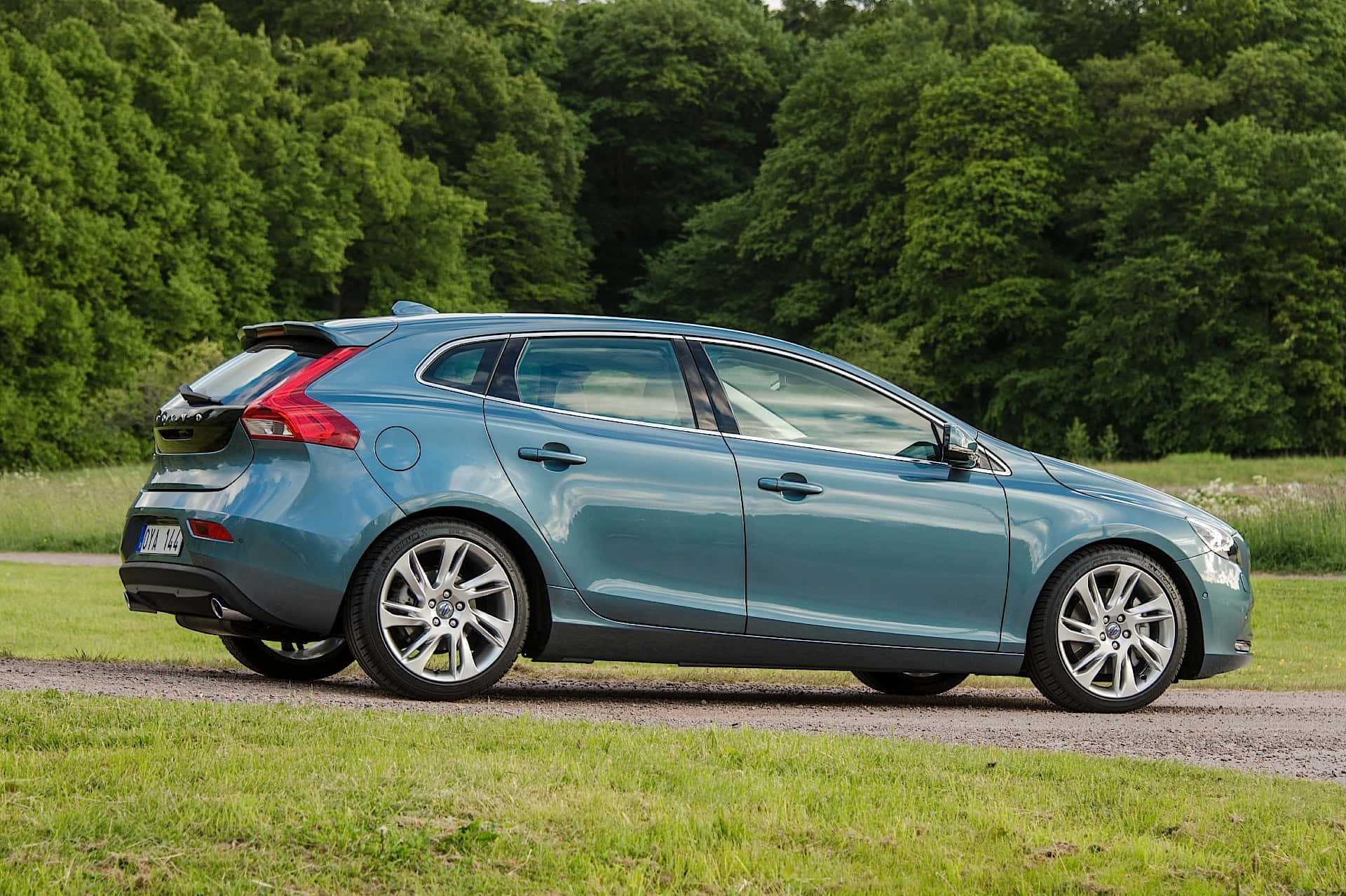 Caption: Stylish Volvo V40 In Urban Landscape Wallpaper