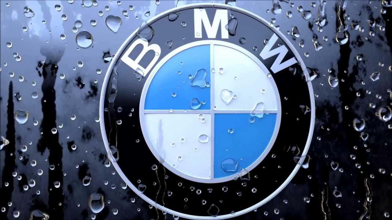 Caption: The Distinctive Bmw Logo: A Symbol Of Luxury And Performance Wallpaper