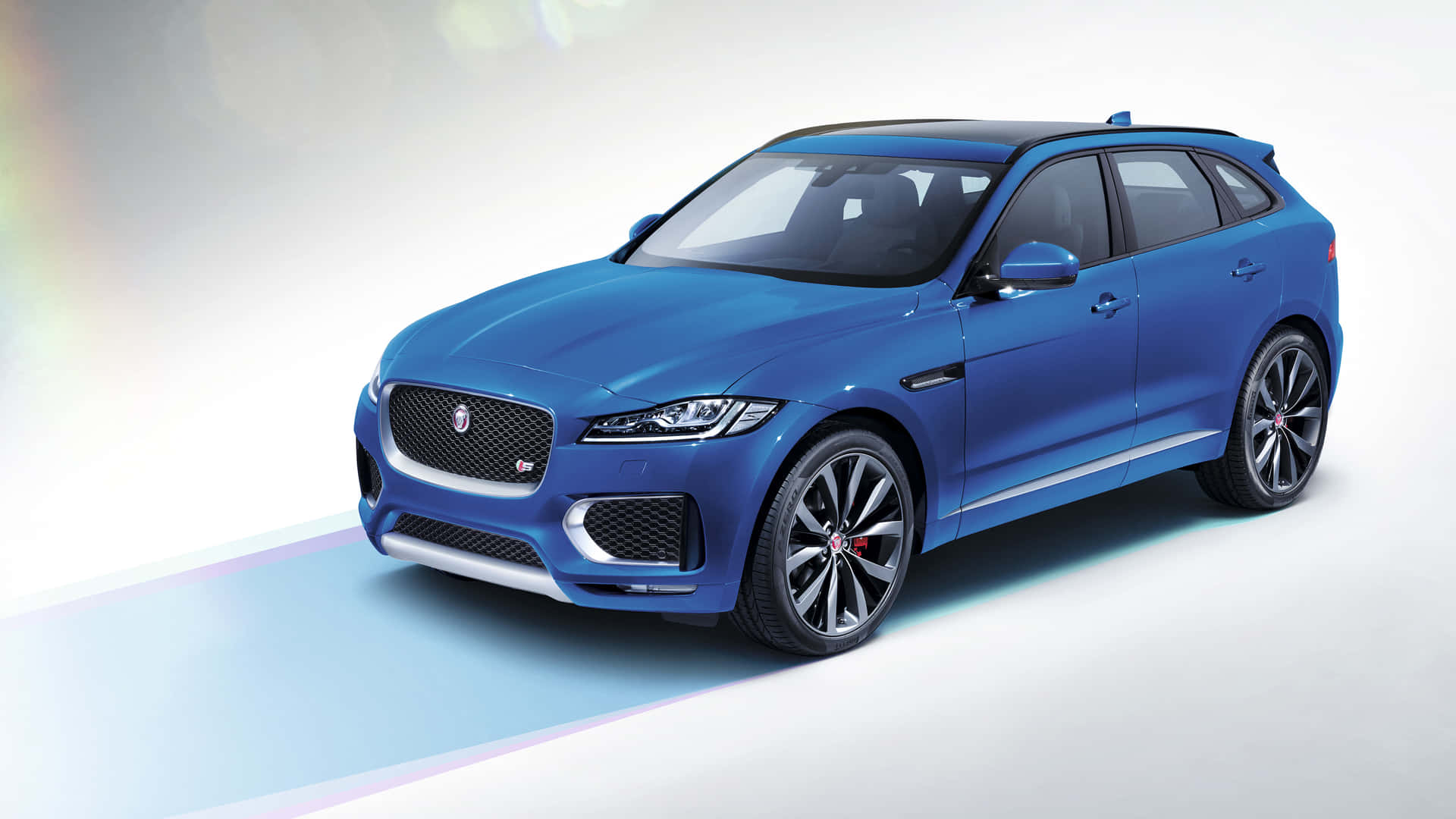 Caption: The Dynamic Jaguar F-pace In Action Wallpaper