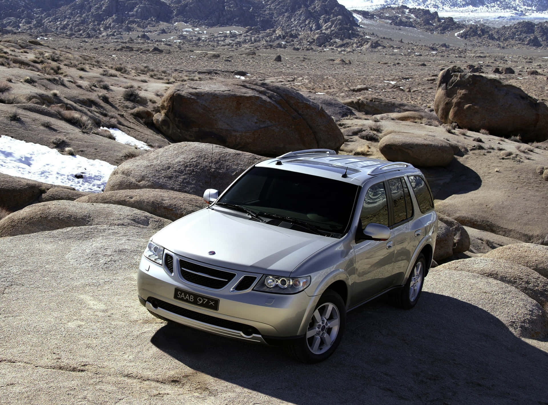 Caption: The Elegance On Four Wheels: Stunning Saab 9-7x On The Street Wallpaper