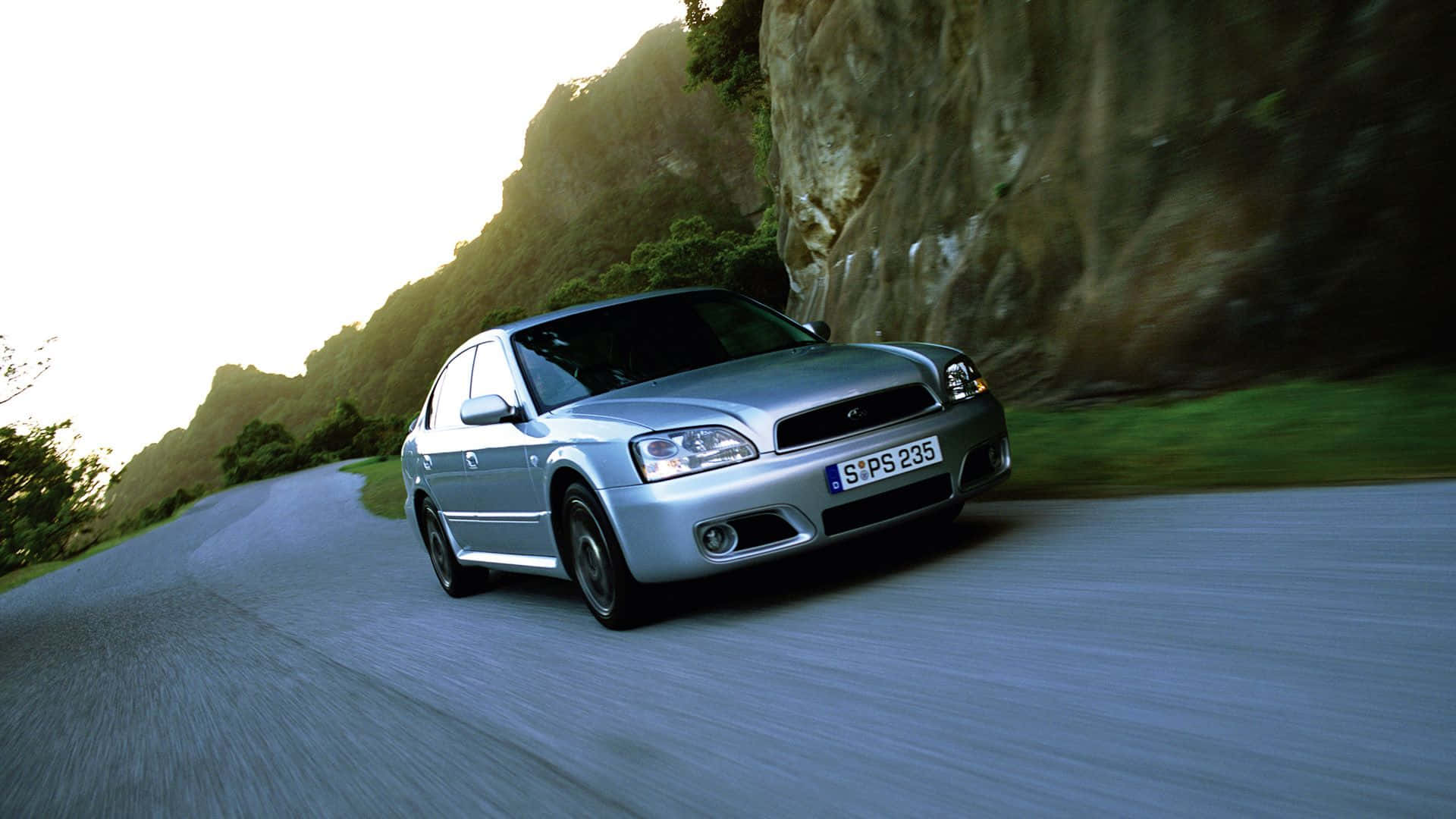 Caption: The Elegant Subaru Legacy Cruising The Highways Wallpaper