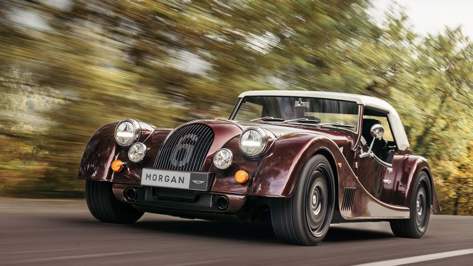 Caption: The Exquisite Morgan Plus Six, Exhibiting British Craftsmanship And Unparalleled Design Wallpaper