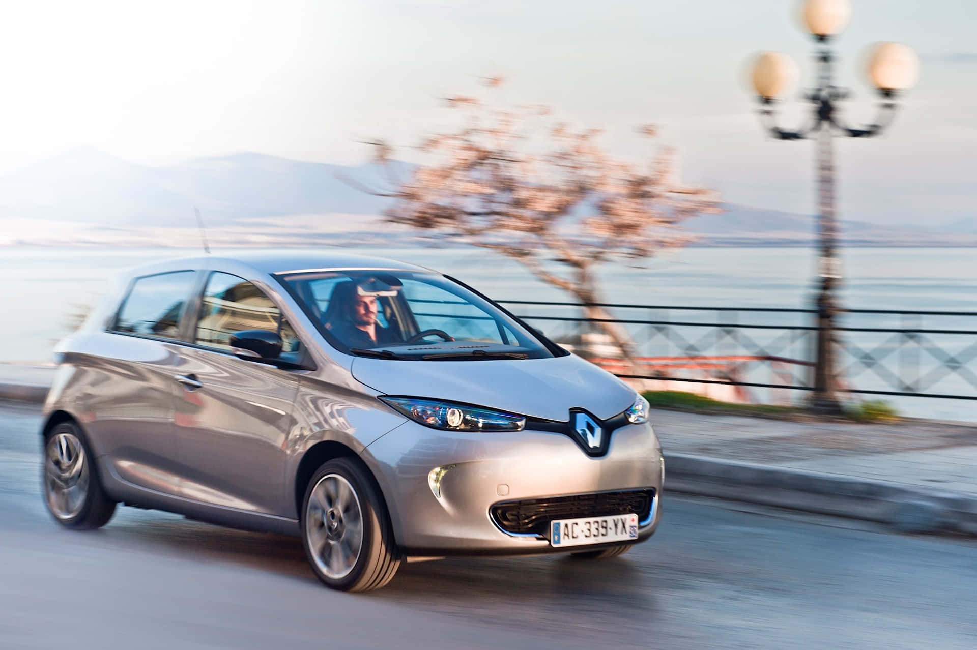 Caption: The Sleek And Modern Renault Zoe - An Eco-friendly Driving Experience. Wallpaper