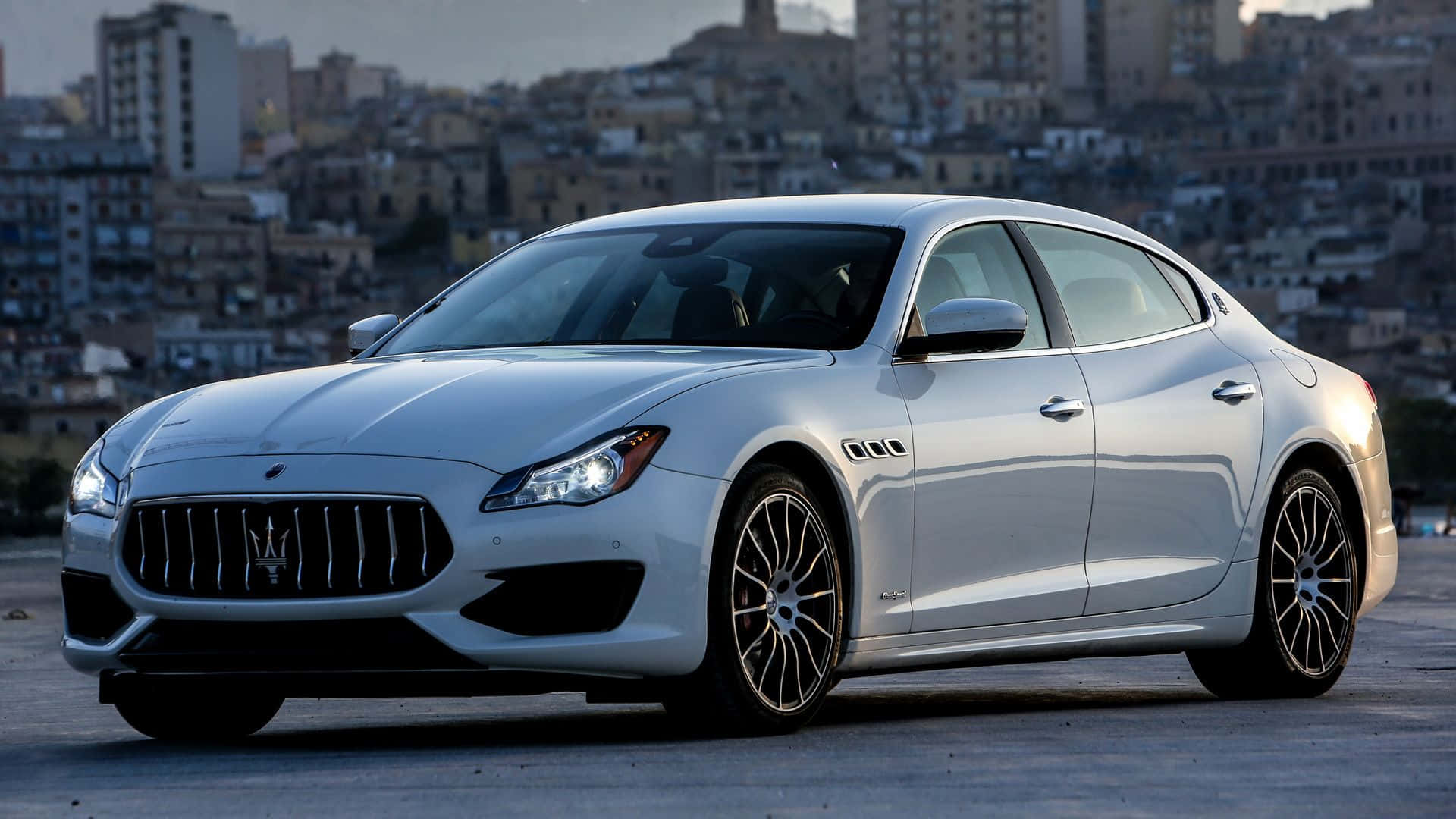 Caption: The Ultimate Blend Of Performance And Luxury - Maserati Quattroporte. Wallpaper