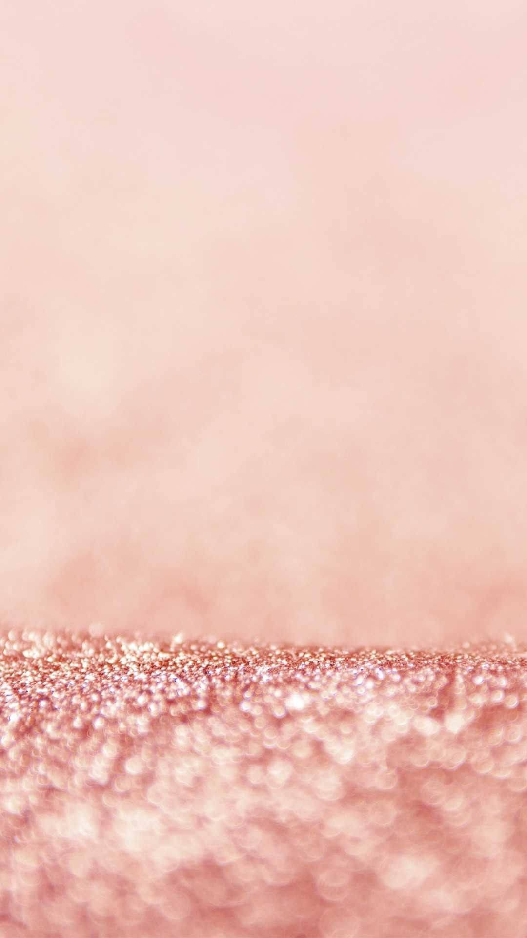 Caption: Trendy Pink Smartphone On A Light Pastel Background Wallpaper