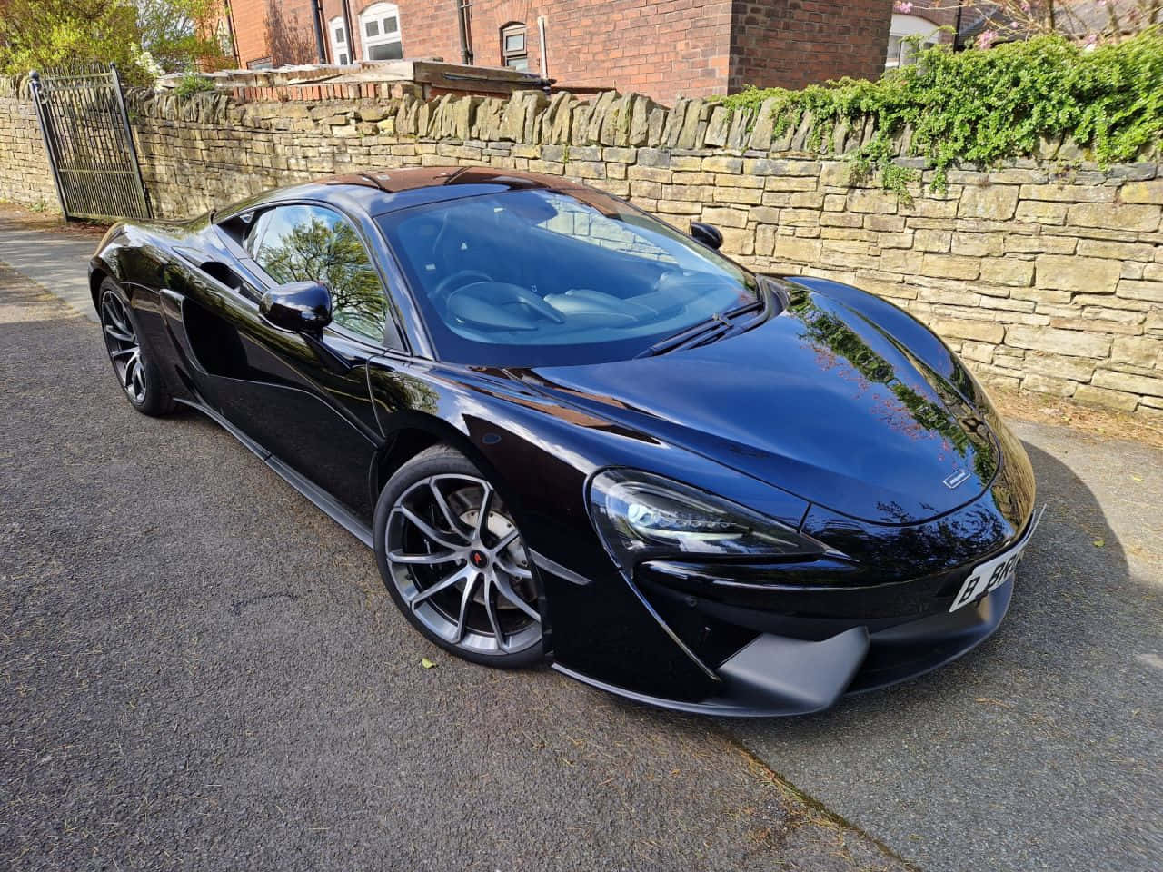 Caption: Unleashed Power - Mclaren 540c On A High-speed Odyssey Wallpaper