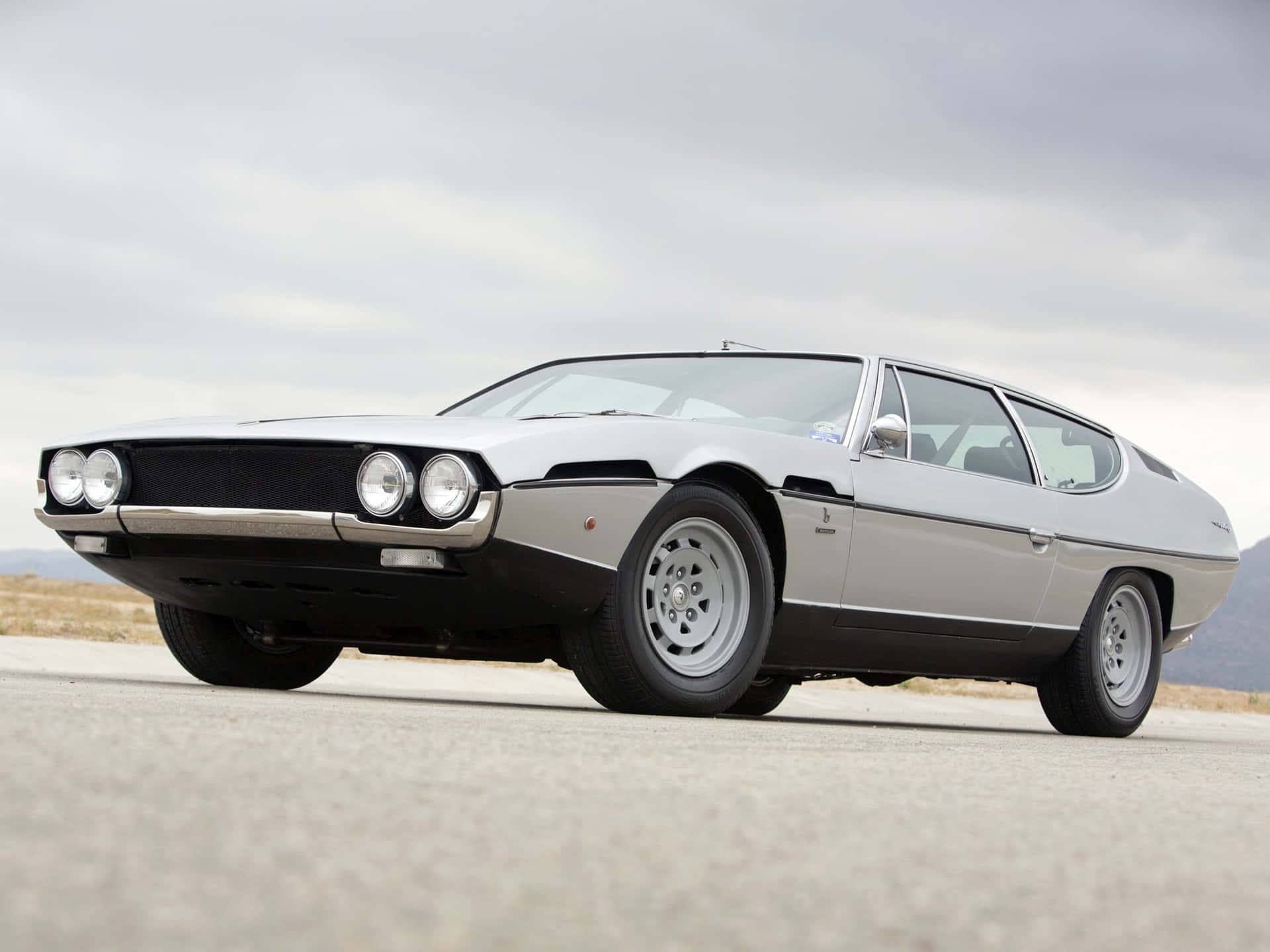 Caption: Unleashing Power And Luxury - Lamborghini Espada Wallpaper