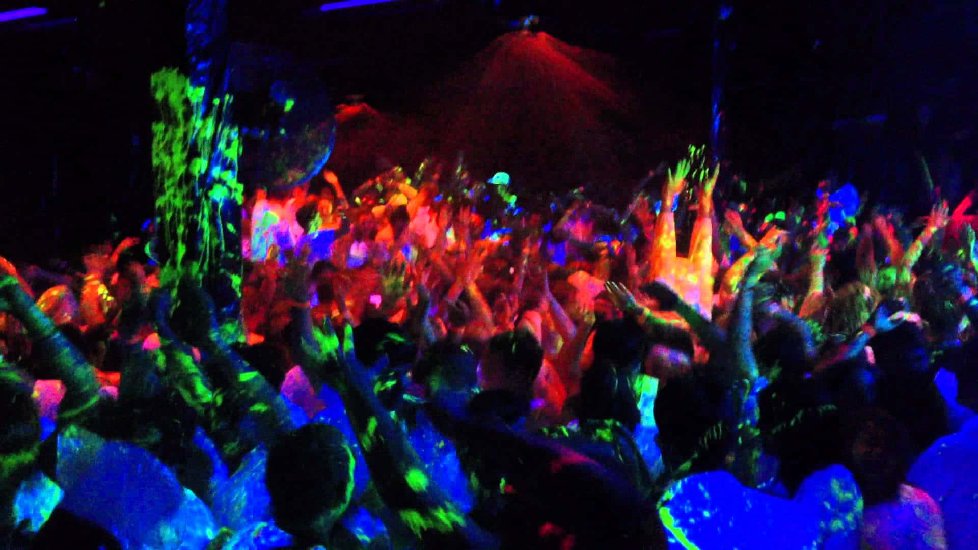 Caption: Vibrant Neon Party Scene Wallpaper