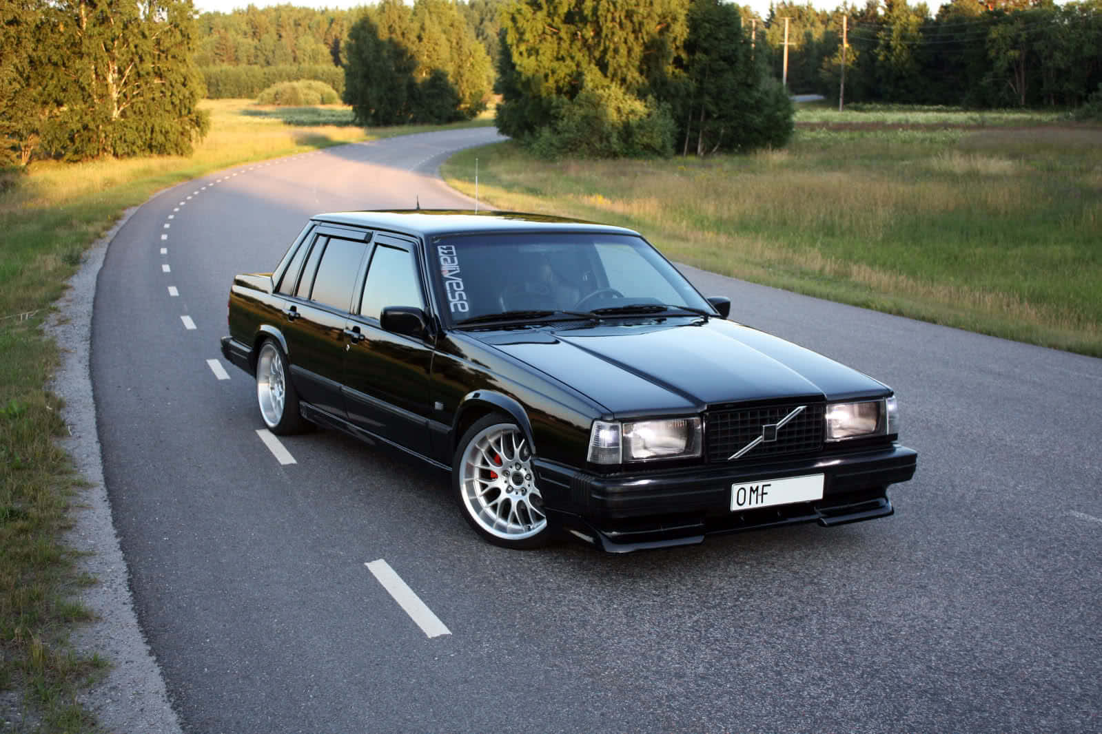 Caption: Vintage Volvo 940 Parked In A Scenic Locale Wallpaper