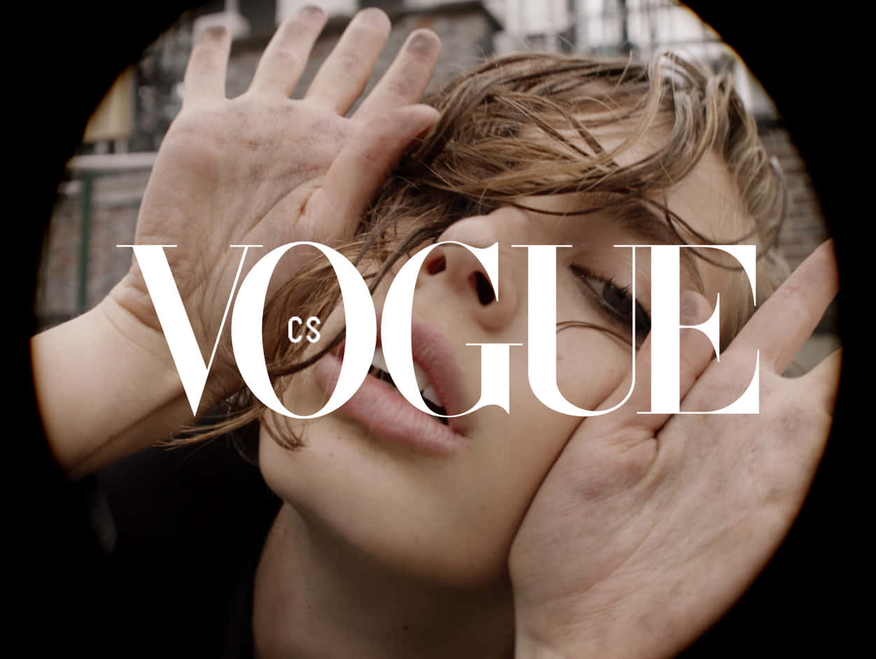 Caption: Vogue's Iconic Logo Represented In Artistic Monochrome Wallpaper