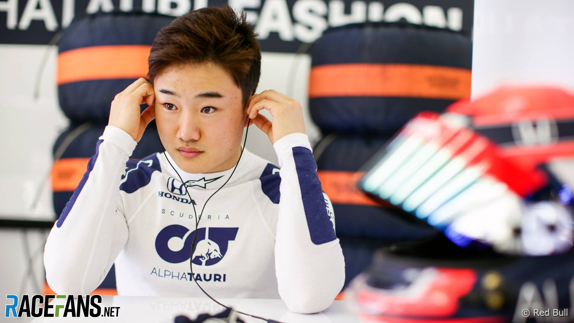 Caption: Yuki Tsunoda Navigating His Formula 1 Car. Wallpaper