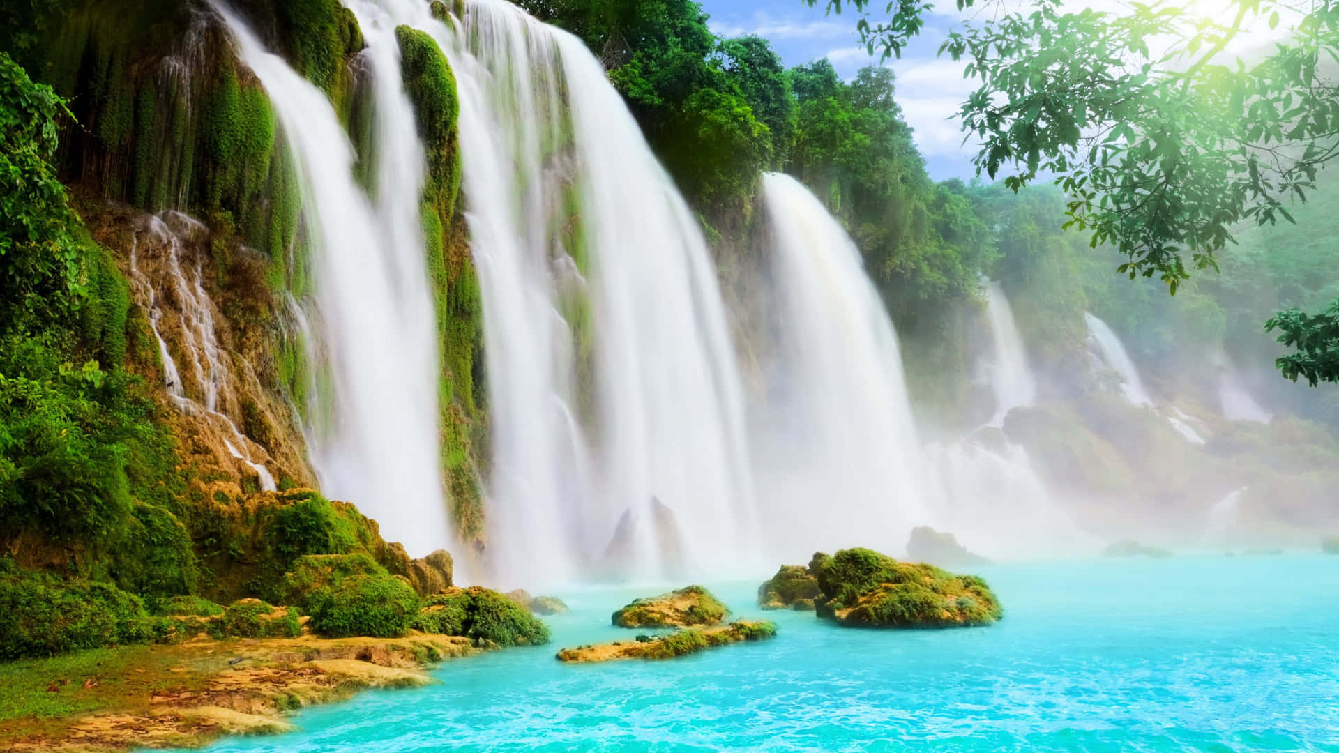 Captivating 4k View Of Majestic Waterfall Wallpaper