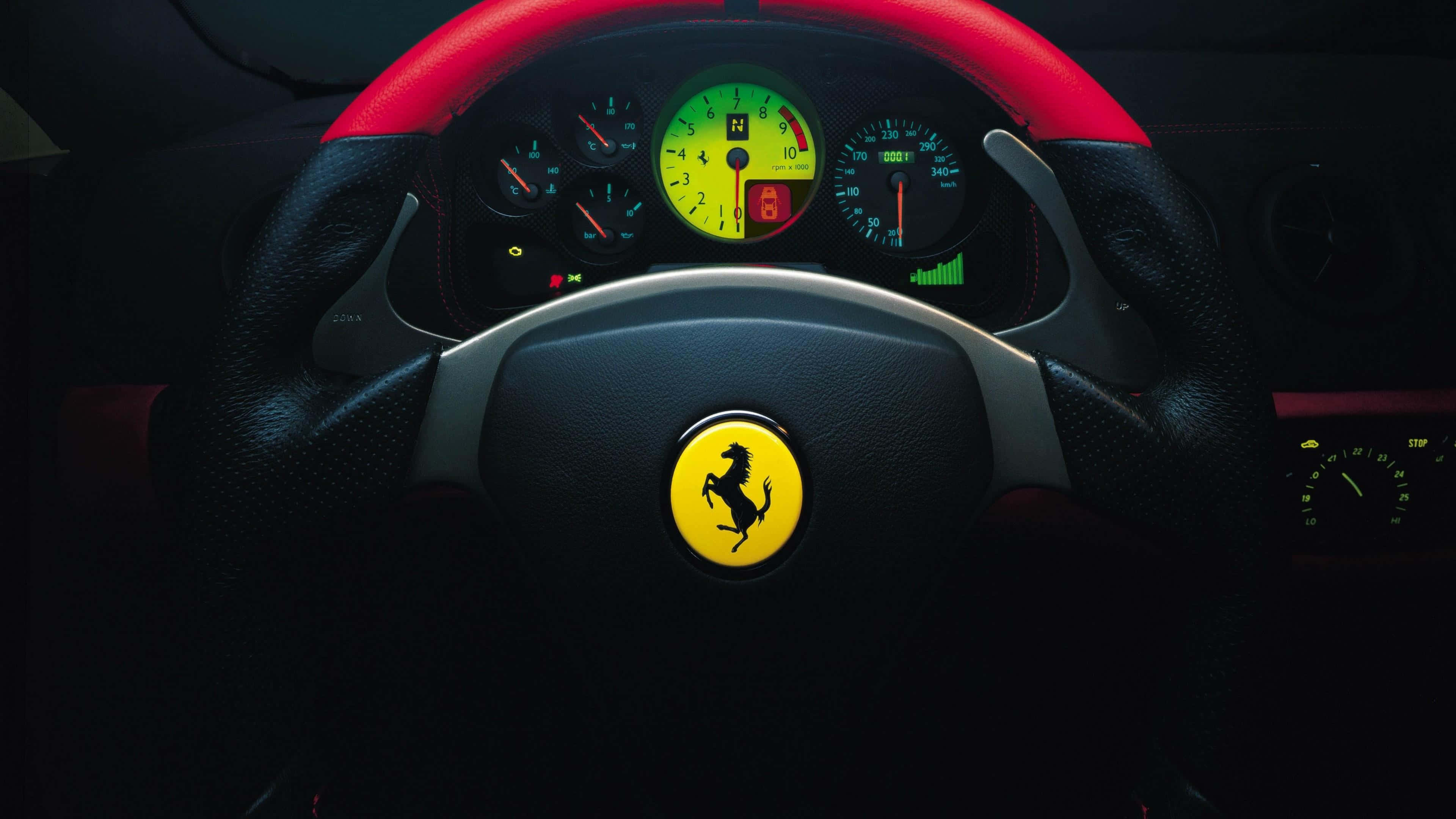 Captivating Control: An Up-close View Of A Car's Steering Wheel Wallpaper