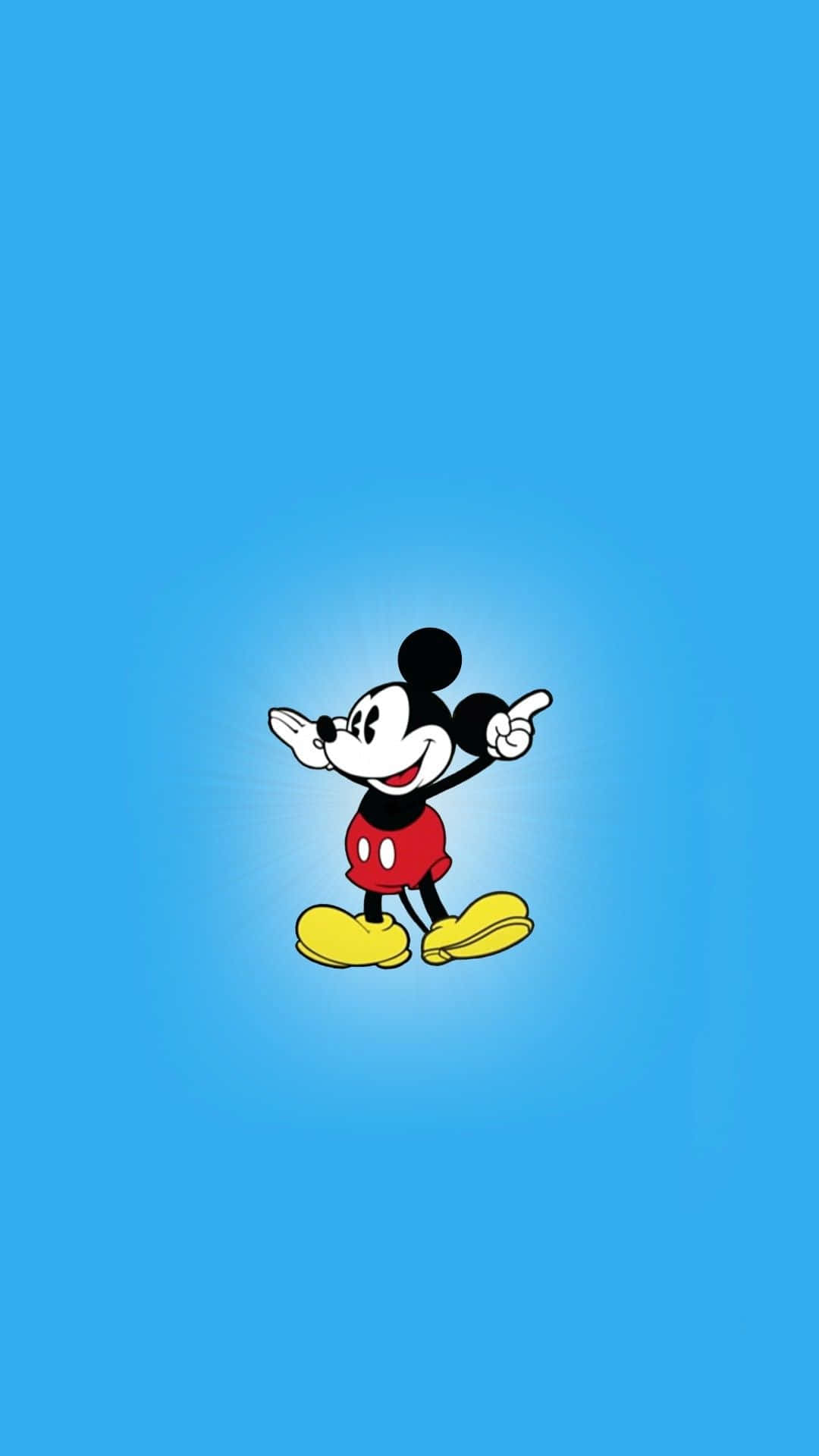 Captivating Image Of America's Beloved Animated Character, Mickey Mouse Against A Vibrant And Colorful Background.