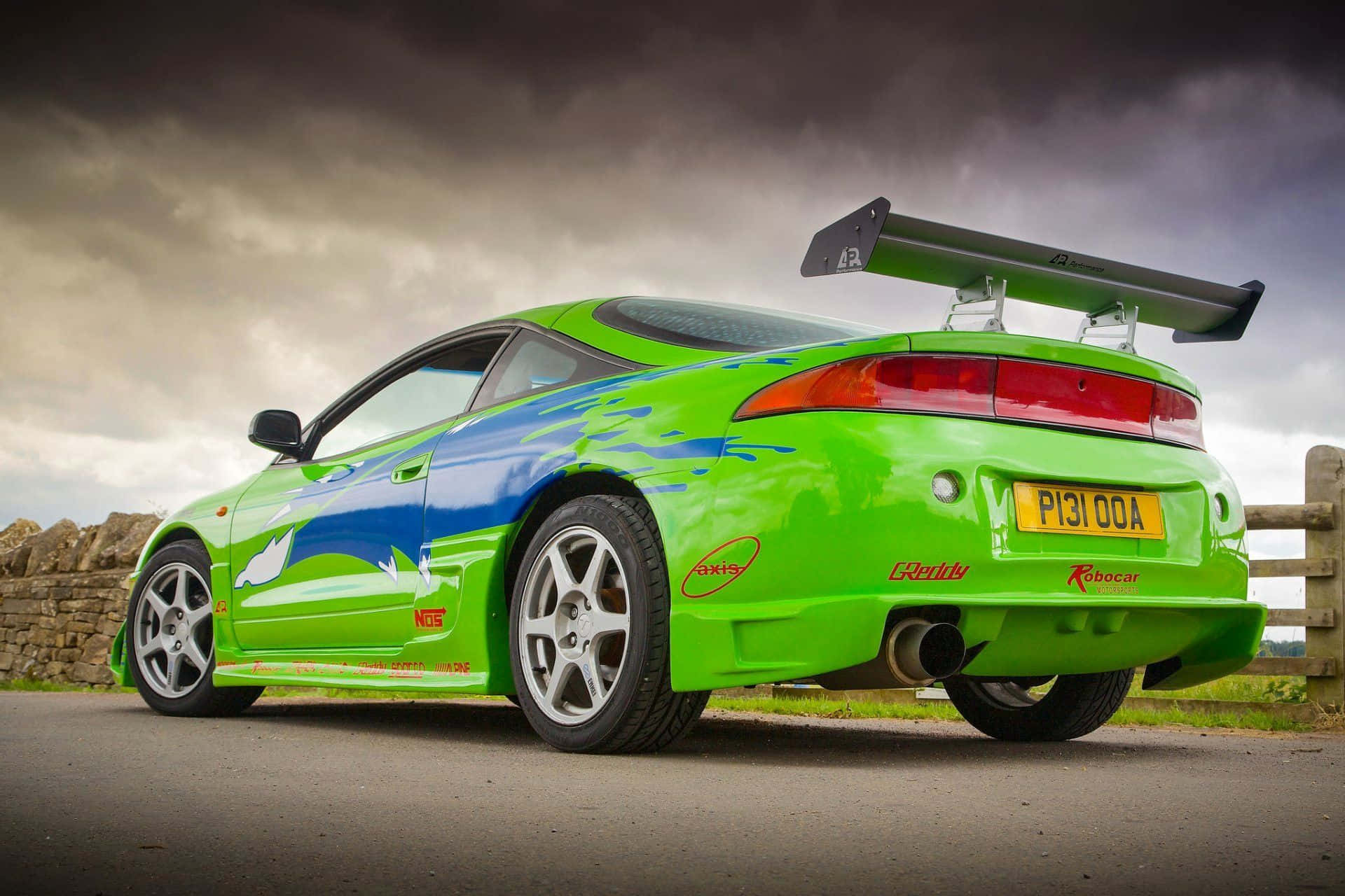 Captivating Mitsubishi Eclipse Against A Stunning Sunset Wallpaper