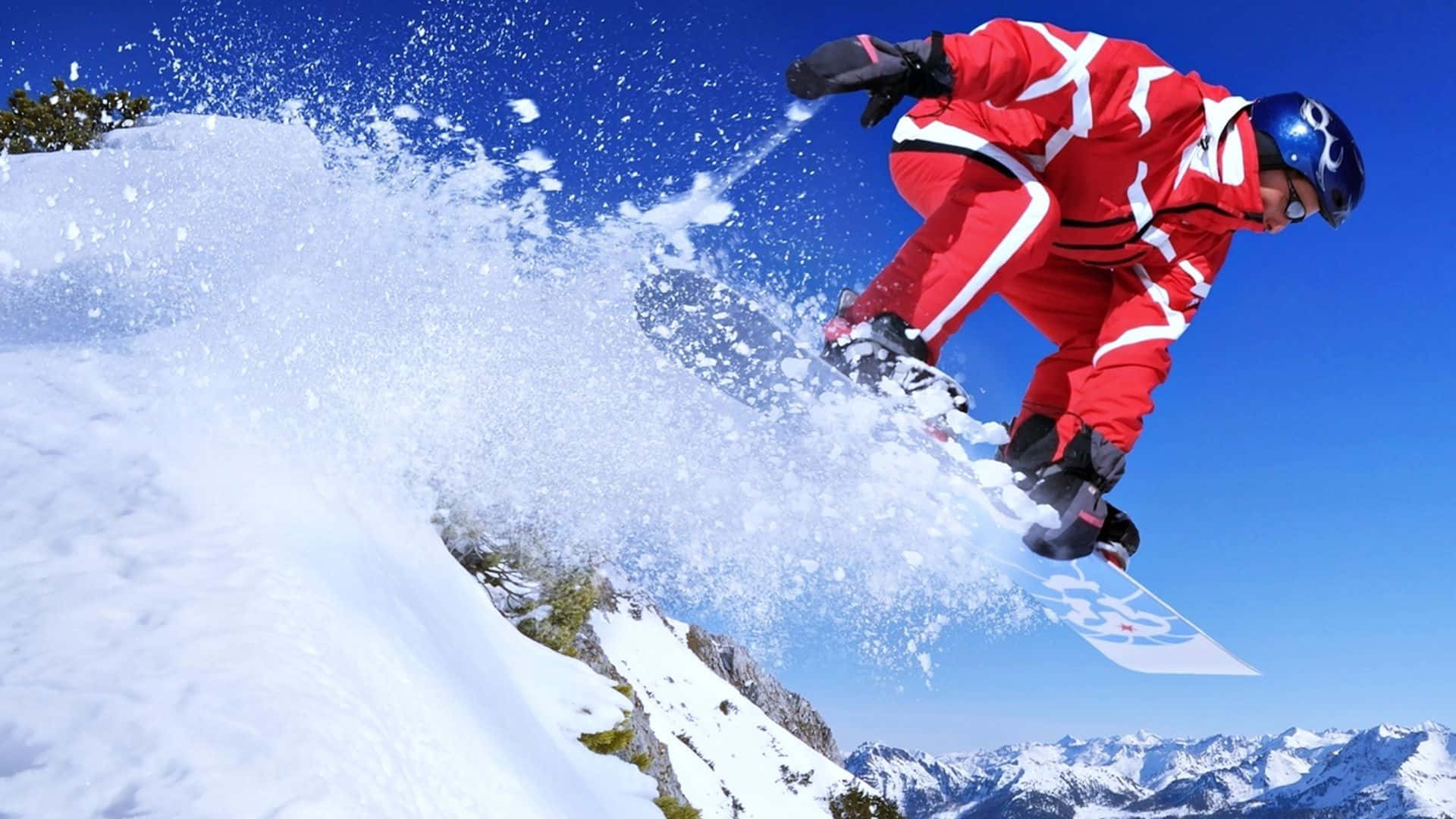 Captivating Moment Of A Skier In Action Wallpaper