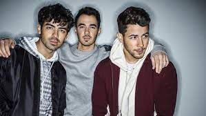 Captivating Moments Of The Jonas Brothers Wallpaper