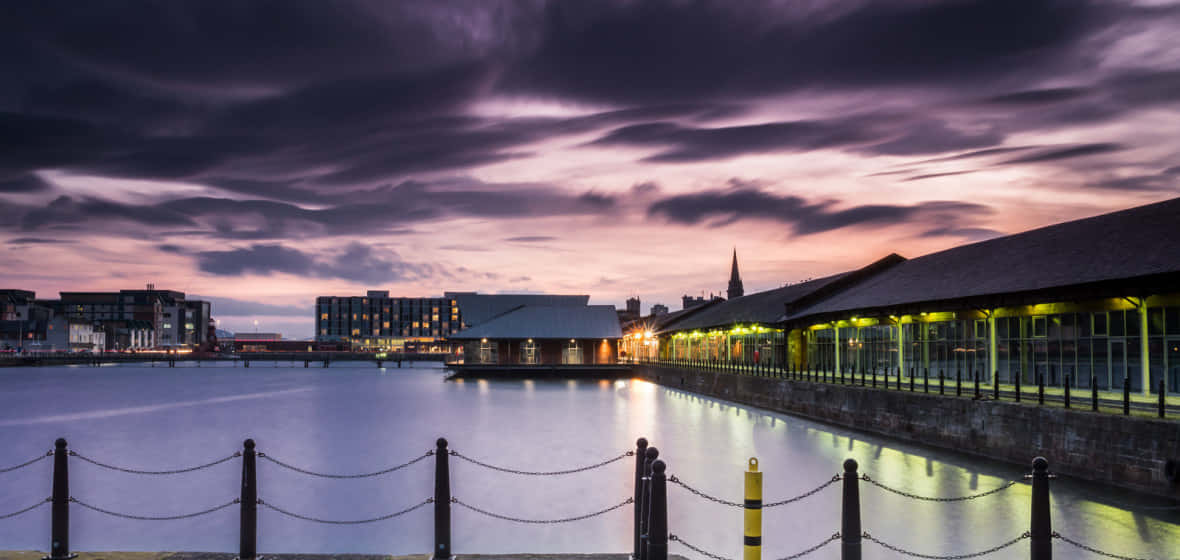 Captivating Night View Of Dundee, United Kingdom Wallpaper
