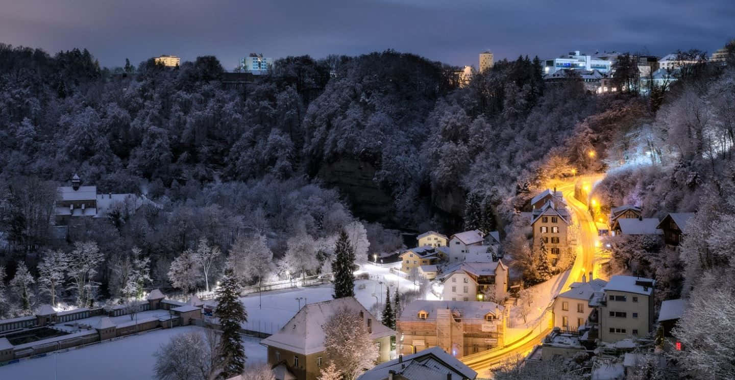 Captivating View Of Medieval Fribourg Wallpaper