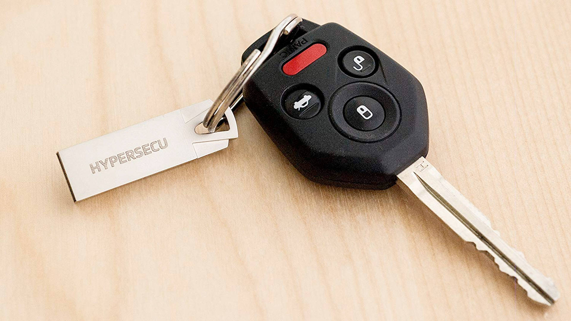 Car Key On Wooden Surface Wallpaper