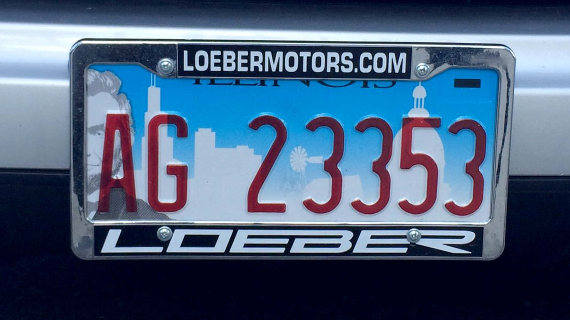 Car License Plate on a Stylish Vehicle Wallpaper