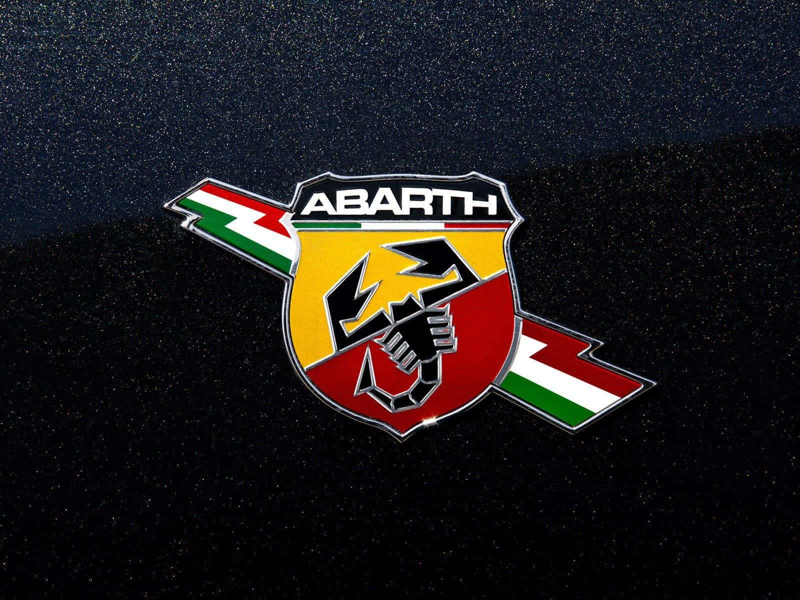 Prestigious Car Logo on a Red Sportscar Wallpaper